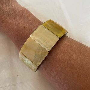 Yellow gold colored stone bracelet